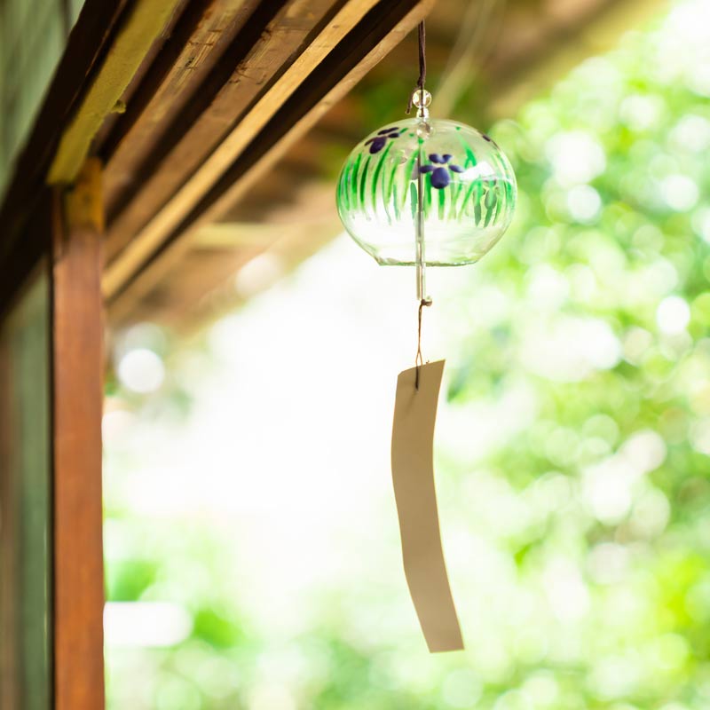 Japanese wind chime hanging by a doorway