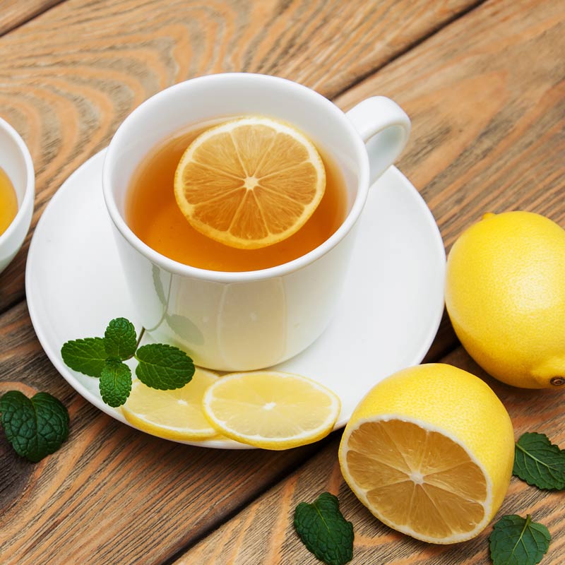 Koucha (black tea) in a cup with lemon