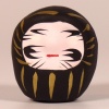 Mini traditional Japanese Daruma doll in black