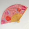 Japanese folding fan with pink snow camellia design