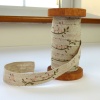 Pink Birds linen tape on wooden reel