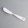White enamel spreader