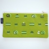 Bright green zip up pencil case with matcha cakes design