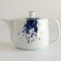 White Japanese teapot with bold cobalt blue ink blot design