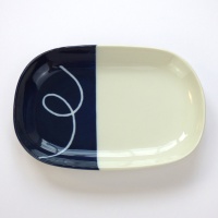 Oval Japanese ceramic plate with navy blue dipped glaze design