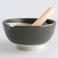 Extra large Japanese suribachi with black glaze, including a hinoki wood surikogi