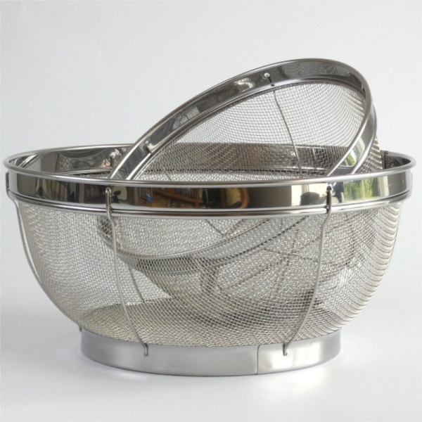 Two large sized Japanese sieves stacked one inside the other