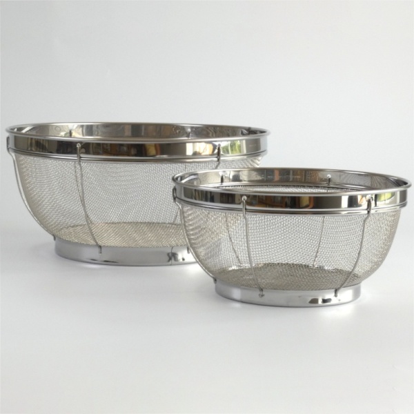 Two large free-standing Japanese stainless steel sieve baskets