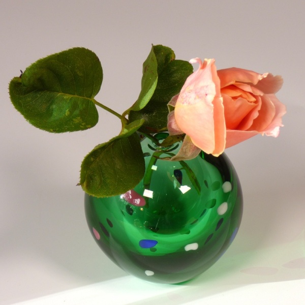 Peach rose in a 'Temari' glass vase