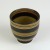 Black Japanese tea cup with red stripe pattern