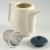 White Japanese teapot with stainless steel infuser and dark blue lid