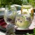 Three floral Japanese glass tumblers on a pretty outdoor table