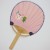 Reverse side of Japanese fan with cute mythical creatures detail on pink background