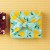 Gift wrapped in light blue yuzu design Japanese furoshiki