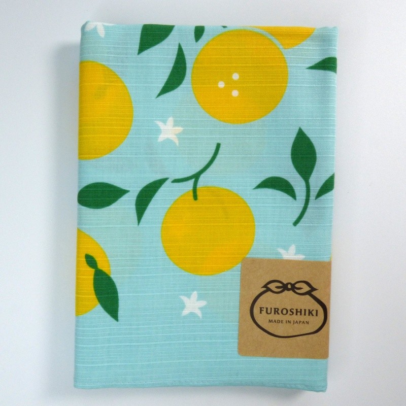 Light blue furoshiki wrapping cloth with yellow yuzu fruit design
