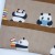 Close up of pandas reading and playing in the library