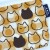Close up of dots and cats design on a zip up fabric pouch