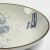 Close up of 'Great Wave' design on Japanese round plate