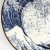 Close up of 'Great Wave' design on Japanese round plate