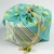 Cotton fabric bento bag with drawstring ties and cute budgie design
