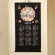 Japanese wall hanging Year of the Horse calendar scroll hanging on a plain wall