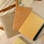 Ro-biki Texture Series Japanese notebooks on a desk with brush pen and calligraphy