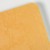 Textured cover details of yellow Ro-biki Tonoko-iro Japanese notebook