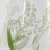 Close up of green and white lily of the valley design on Japanese glass tumbler