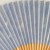Close up of pale blue reverse side of Japanese paper fan